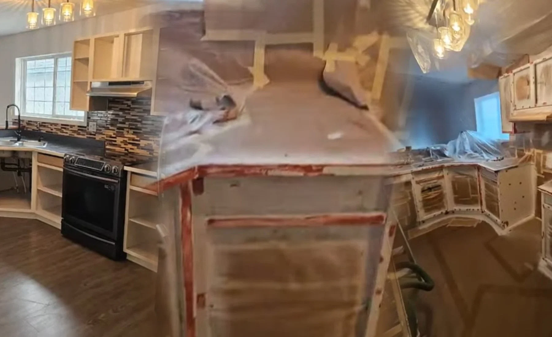 Refinished kitchen cabinets with a smooth professional painted finish